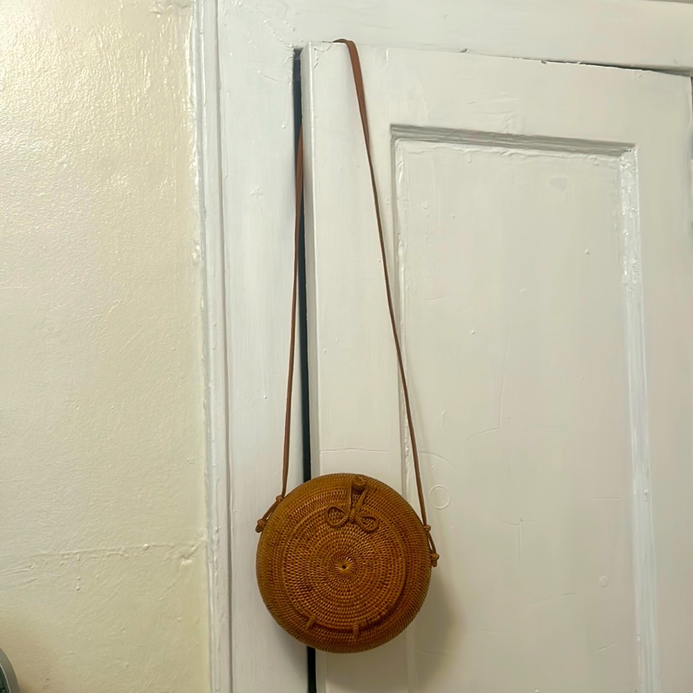 Handmade in Thailand, round wooden bag with floral inside print and long strap